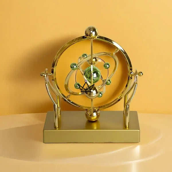 Goldene kinetische Schreibtisch-Skulptur Himmelsorbit - ASTRALIS