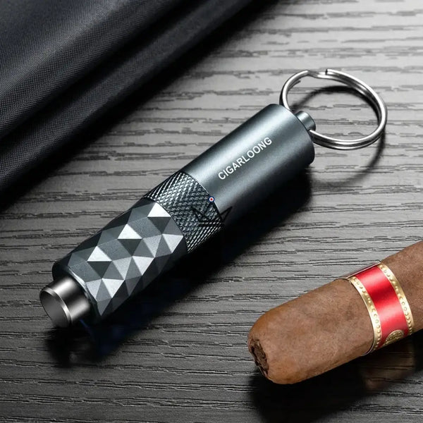 Diamond-faceted cigar punch keychain, 5 colors — FACETTE, Blue