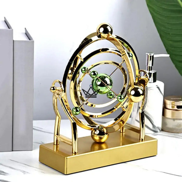 Goldene kinetische Schreibtisch-Skulptur Himmelsorbit - ASTRALIS